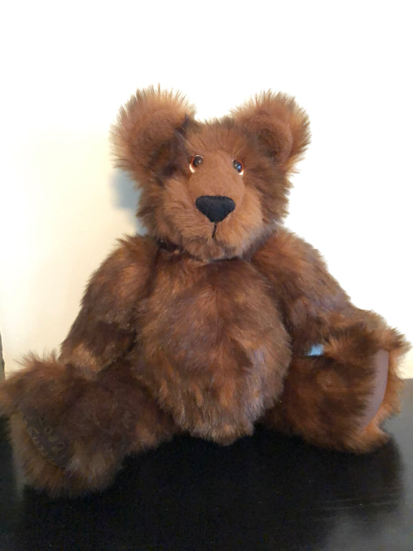 Fluffy, brown teddy bear